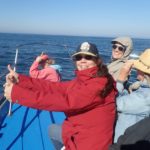 Women whale watching - Blue Water Ventures